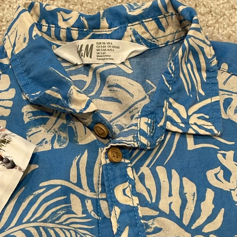 Set of TWO tropical print short sleeve button front shirts, size 6